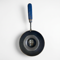 Handmade pan-style selroti karai with blue handle and no branding