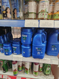 Parachute coconut oil bottles on the Prasadi Store shelf